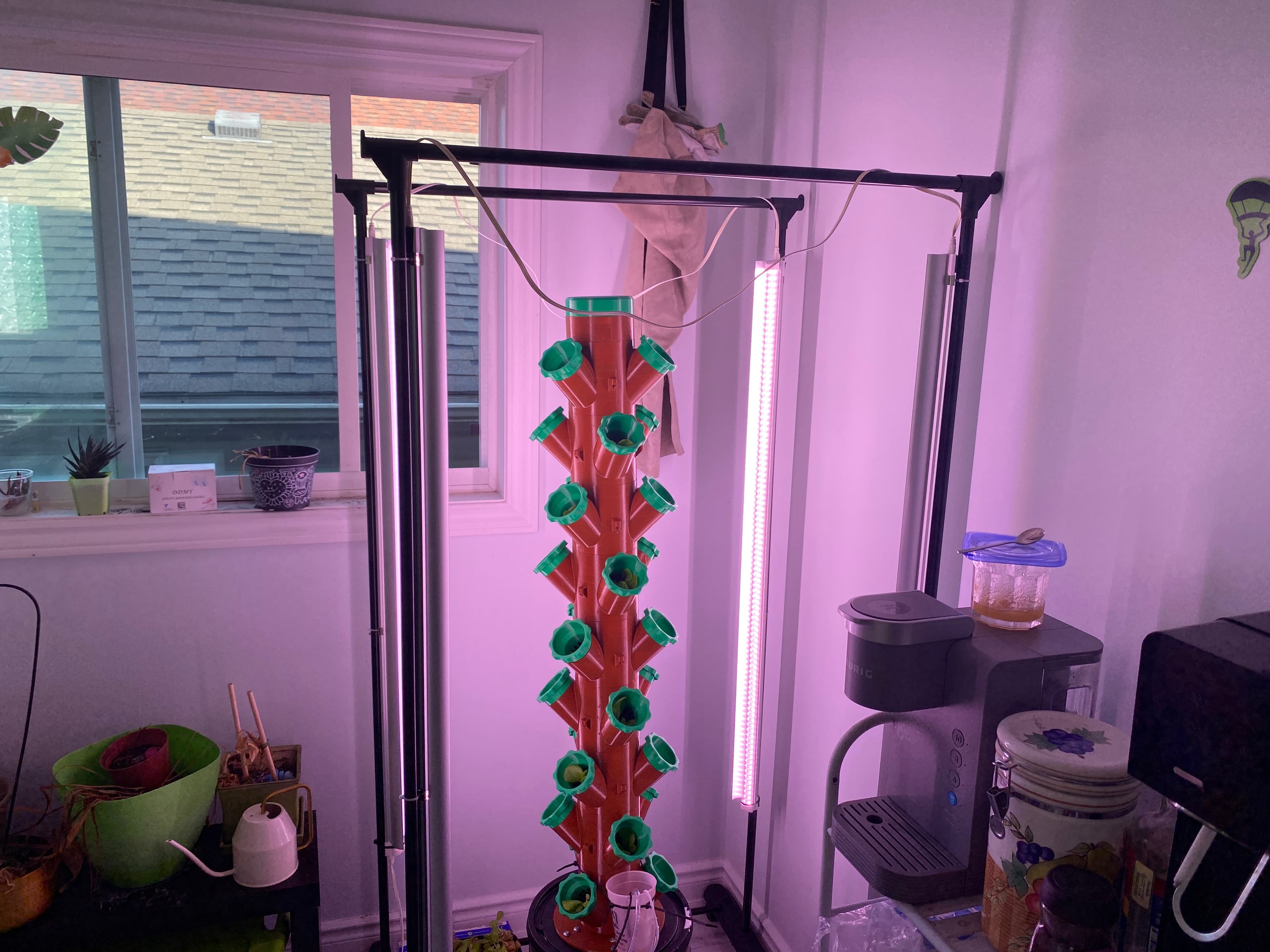 Indoor hydroponic tower garden with LED grow lights